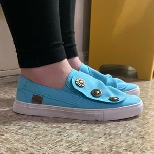 Blue slip on shoes.